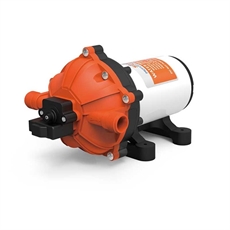 Kompakt vattenpump med orange och vita element, monteringsfötter och flera anslutningspunkter.
